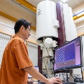 Senior Research Fellow Dr Tay Yee Yan – from NTU Singapore’s Facility for Analysis, Characterisation, Testing and Simulation – with an aberration-corrected transmission electron microscope.