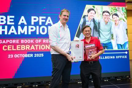 NTU Provost Christian Wolfram receiving the Singapore Book of Records