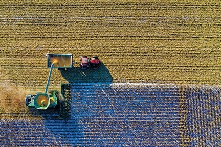 Harvester in a field