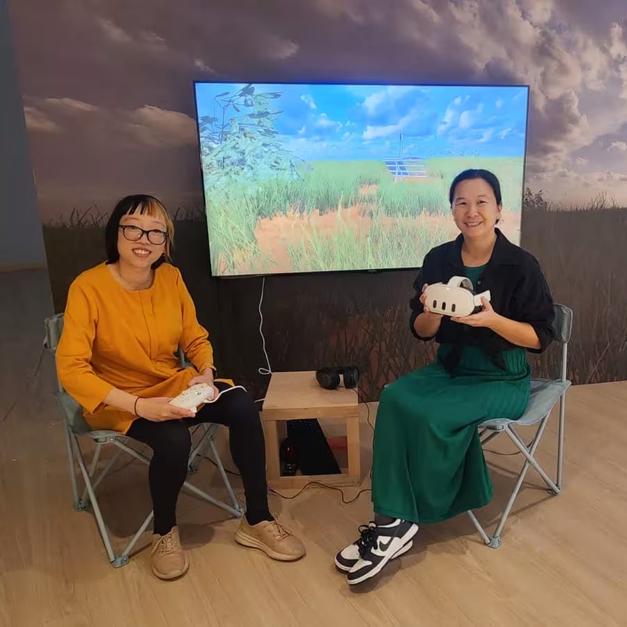 Debbie Ding and NTU Museum staff in front of Wastelands