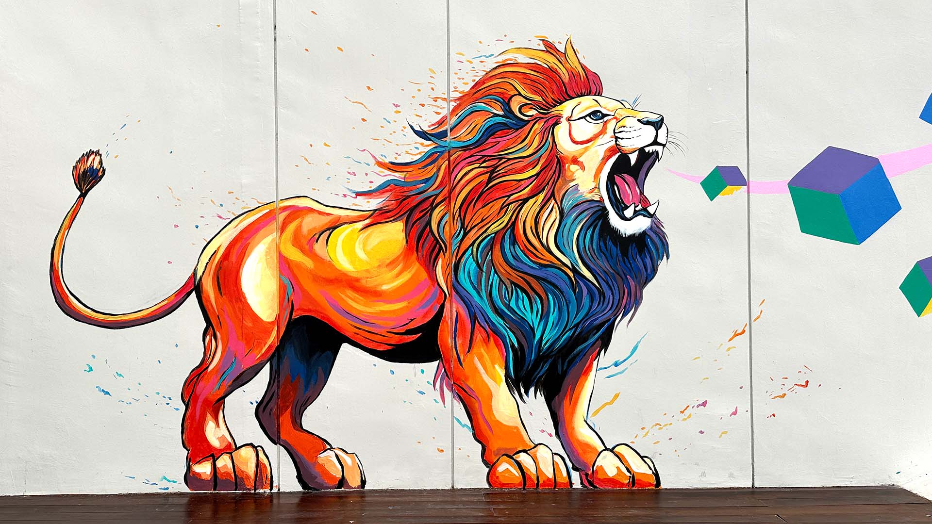 OneNTU Mural - Illustation of orange coloured lion on wall at NTU North Spine