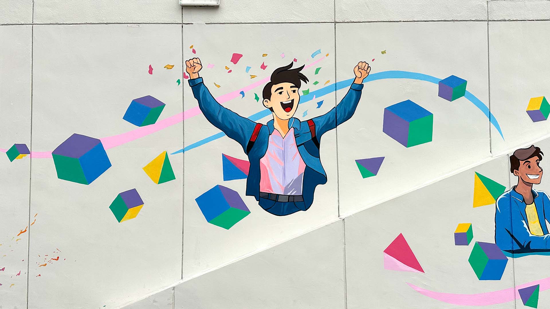 OneNTU Mural - illustration of men with hands in the air cheering and colourful shapes around him