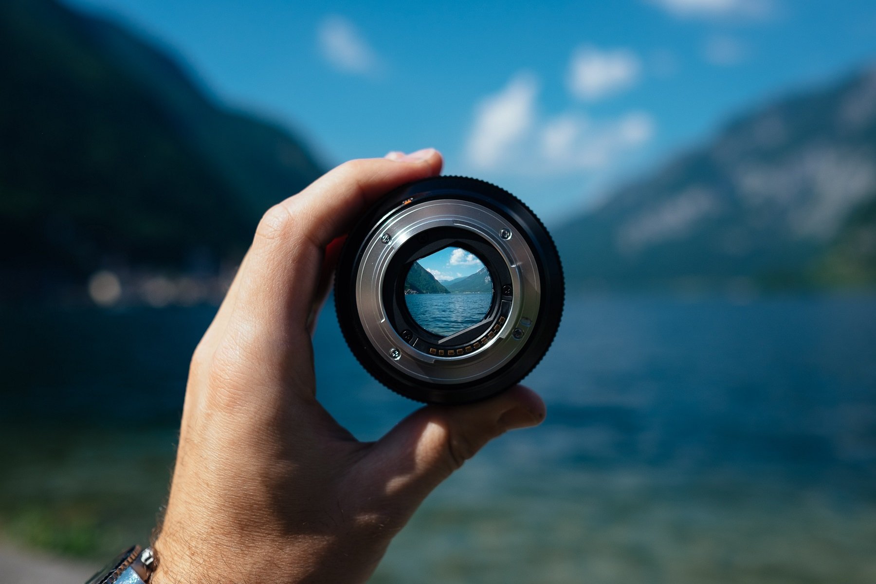 Camera focus with Mountain and lake  scenary as backdrop