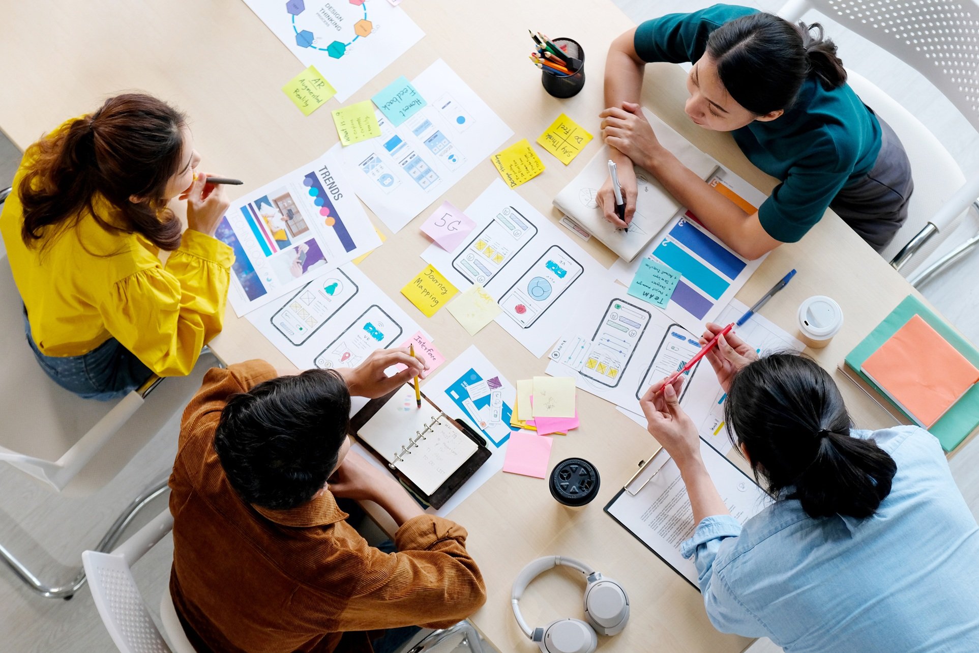 Students working on papers with illustration