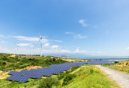 clean energy landscape, solar power station and wind farm