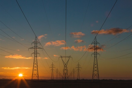 Power towers at sunset