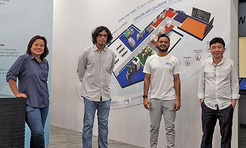 Thumbnail photo of 4 adults, 1 female and 3 male.