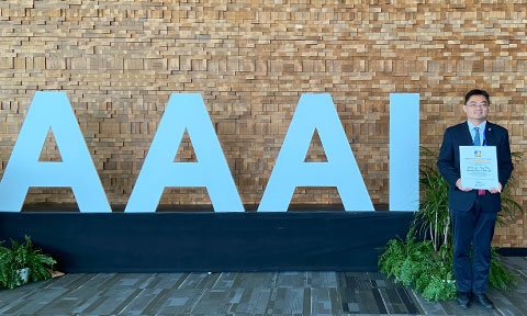 Photo of NAP Yu Han at AAAI.
