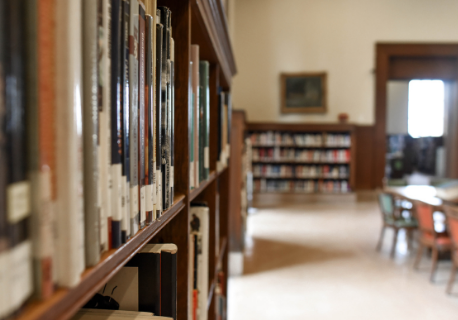 Picture of a library with books neatly arranged