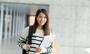 EEE graduate student going to class