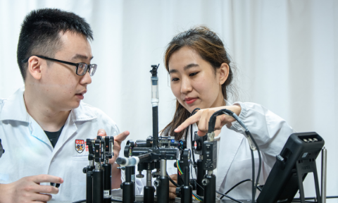 Shot of two researchers from School of Electrical and Electronic Engineering lab