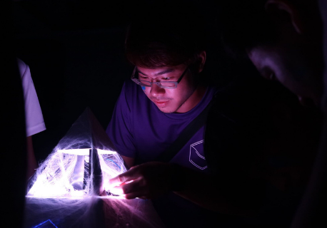 Student is busy focusing on his garage project