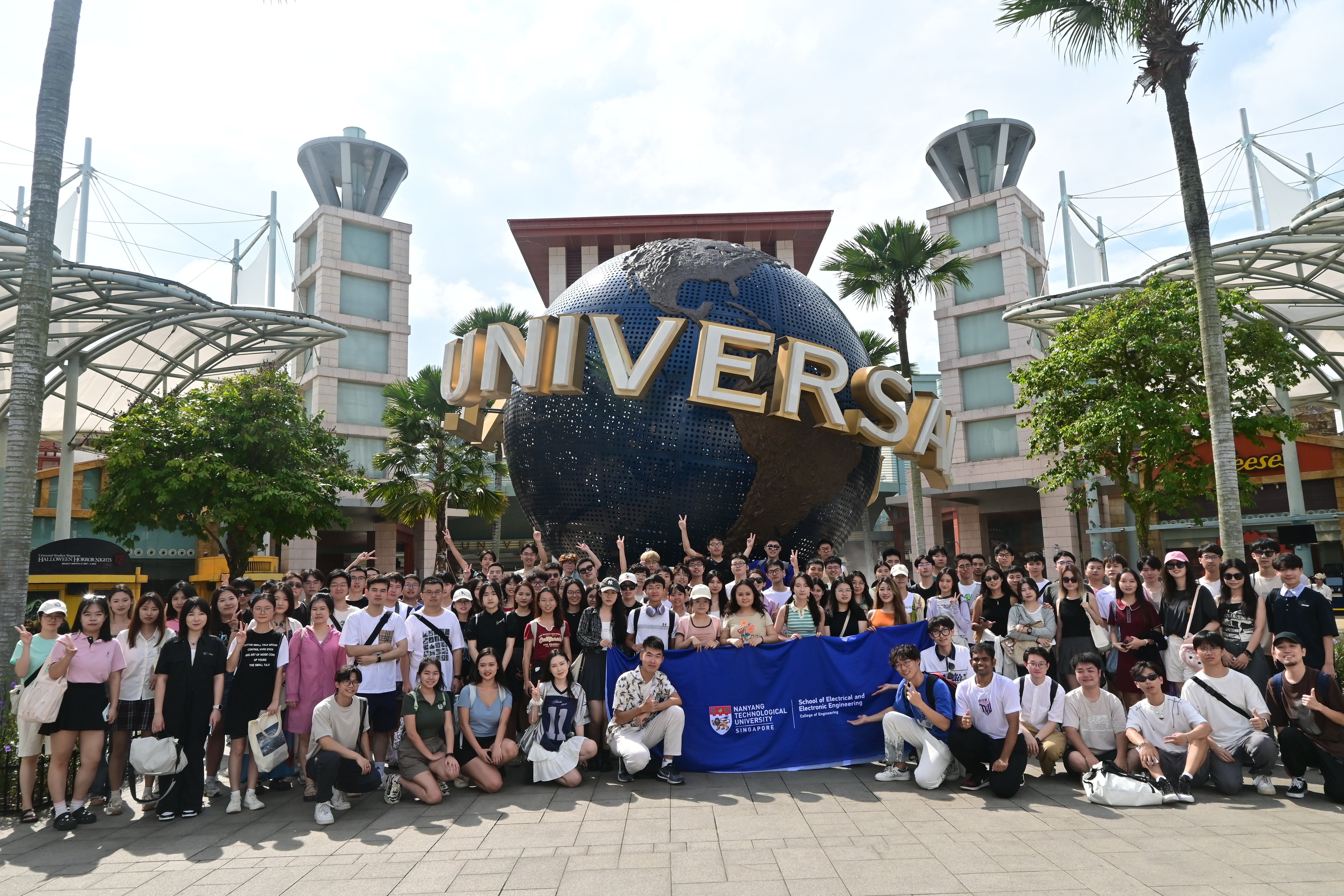 NTU EEE MSc Students posing for a group shot at Universal Studio Singapore
