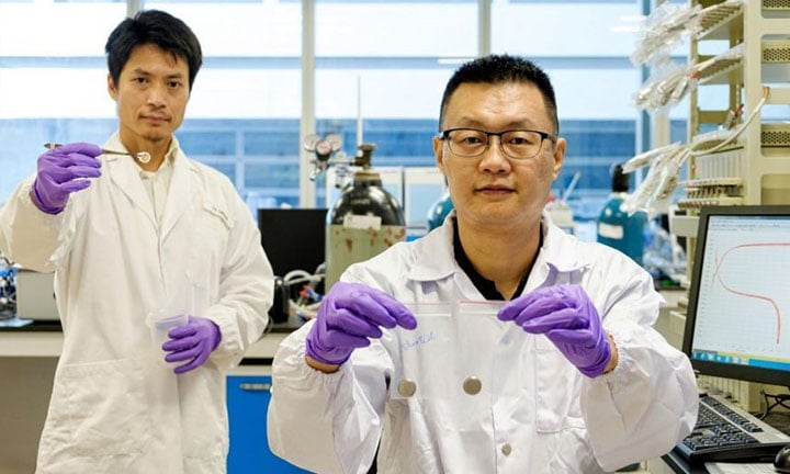 Two scientists showcasing new technology on improving safety of lithium-ion batteries during charging