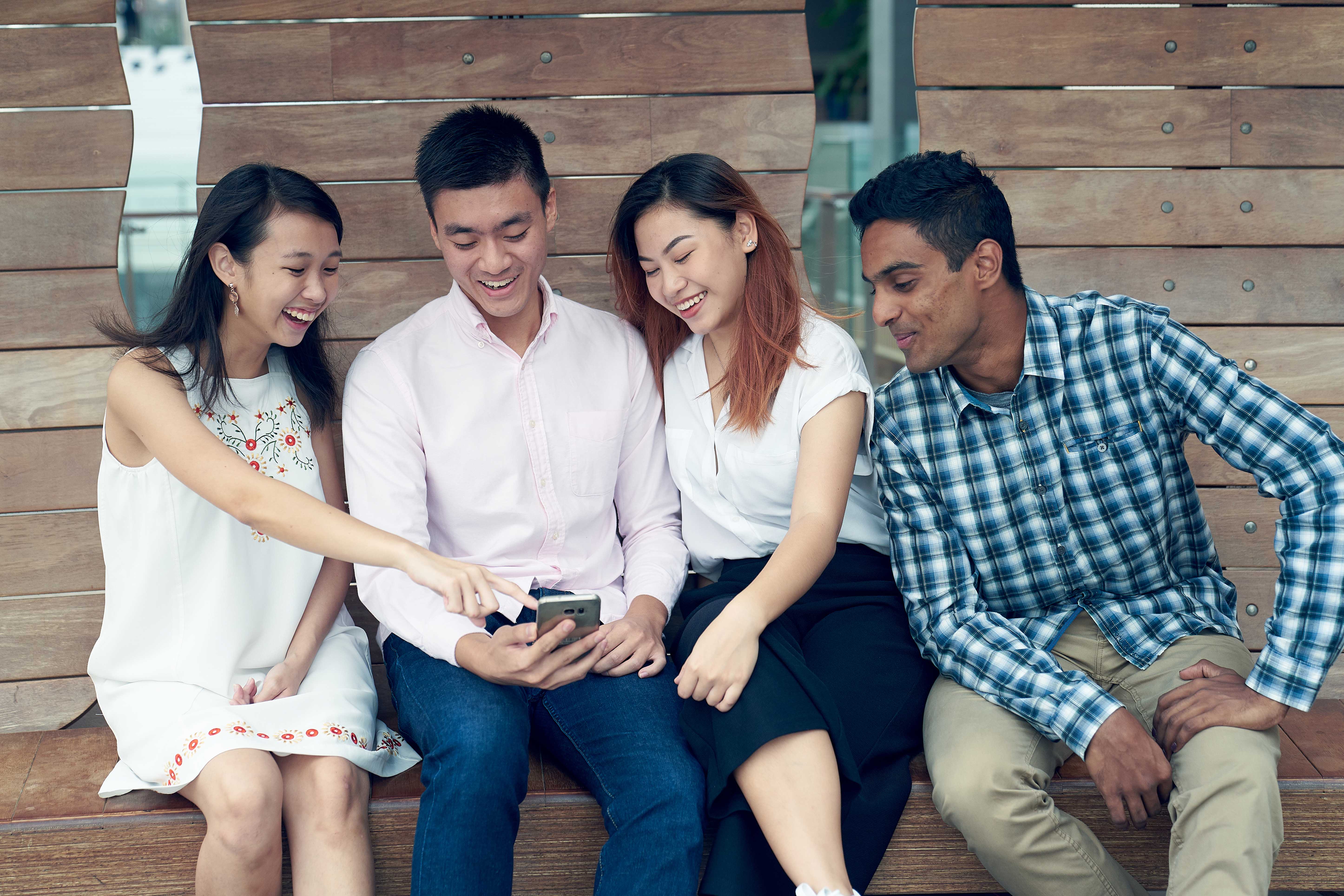 Four students and a mobile phone