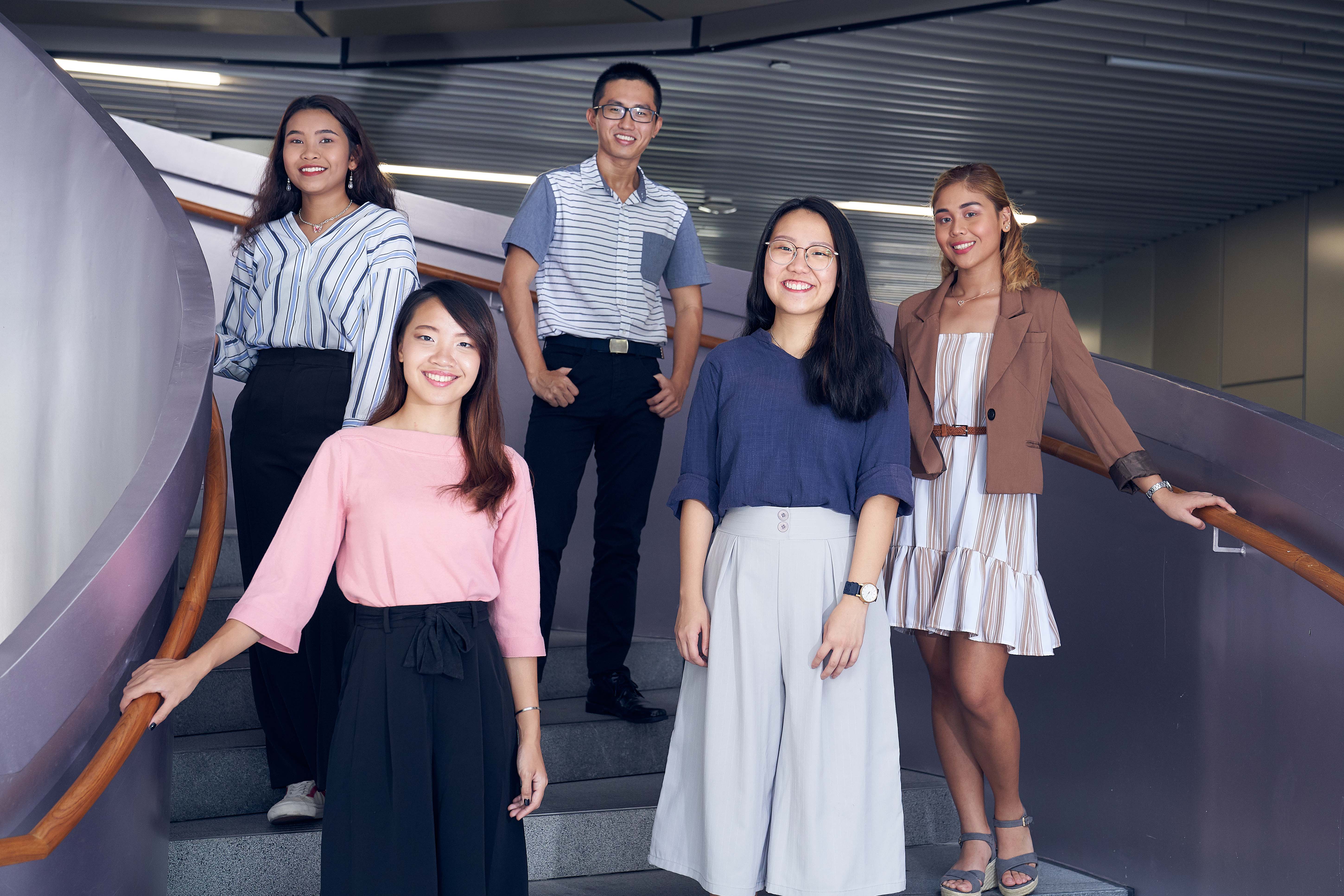students standing on steps