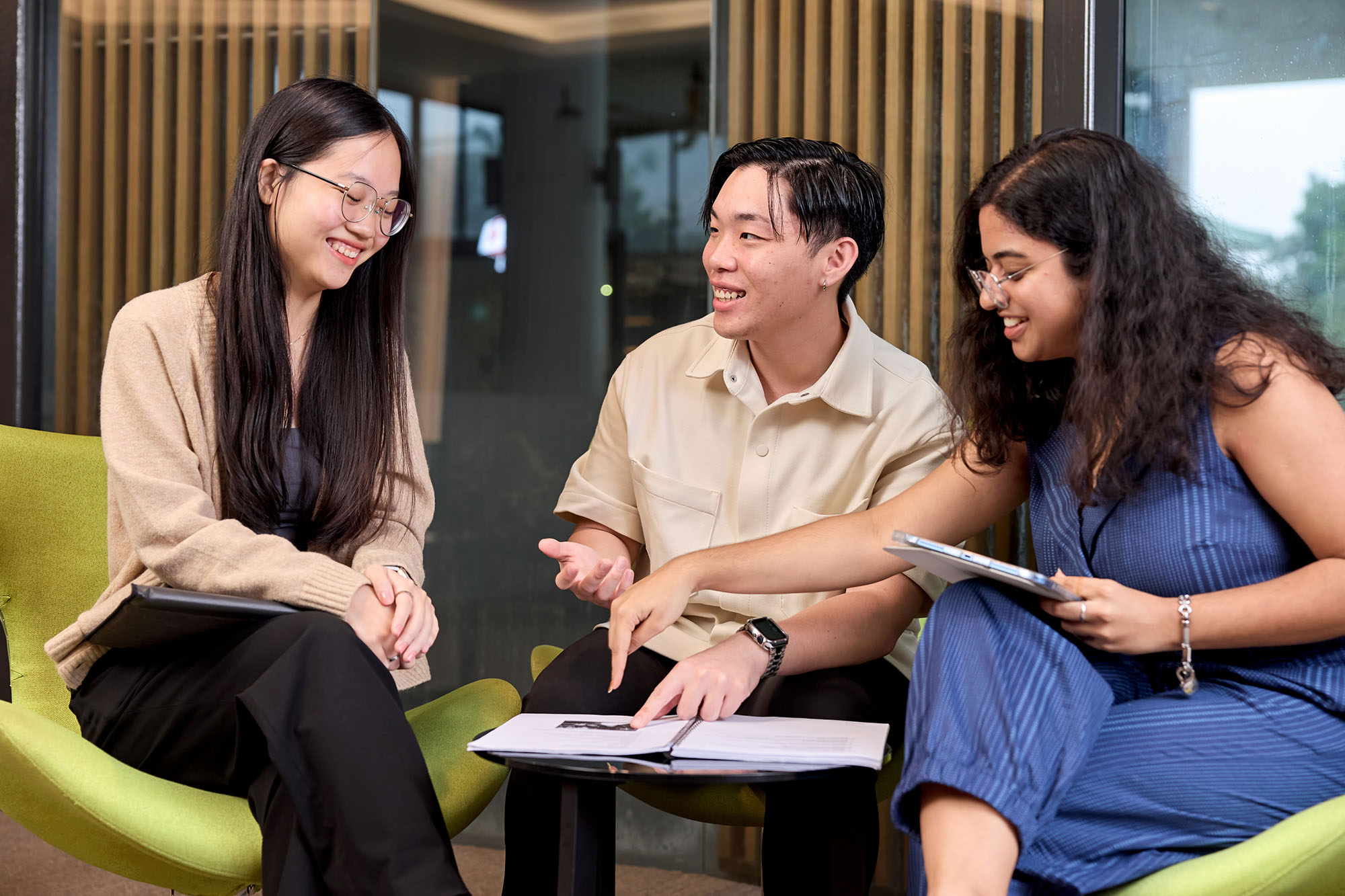Three students having a discussion