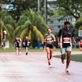 16 Competitive runners nearing the finish line