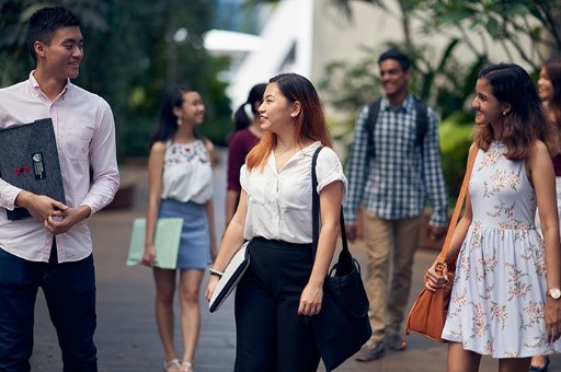 Group of International Trading Programmes students walking in Nanyang Business School, Singapore