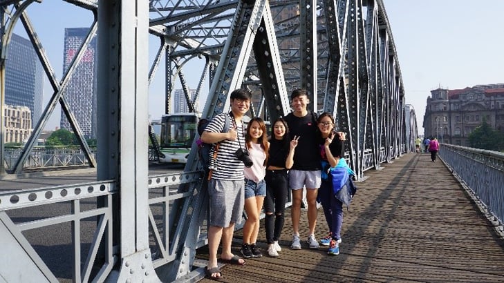 Interns from the Maritime Studies with International Trading Specialisation Programme on a bridge in Shanghai