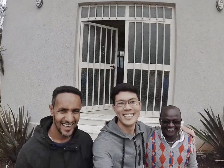 A business major in Banking and Finance (ITP) intern, with a two Wilmar International employees in Ethiopia