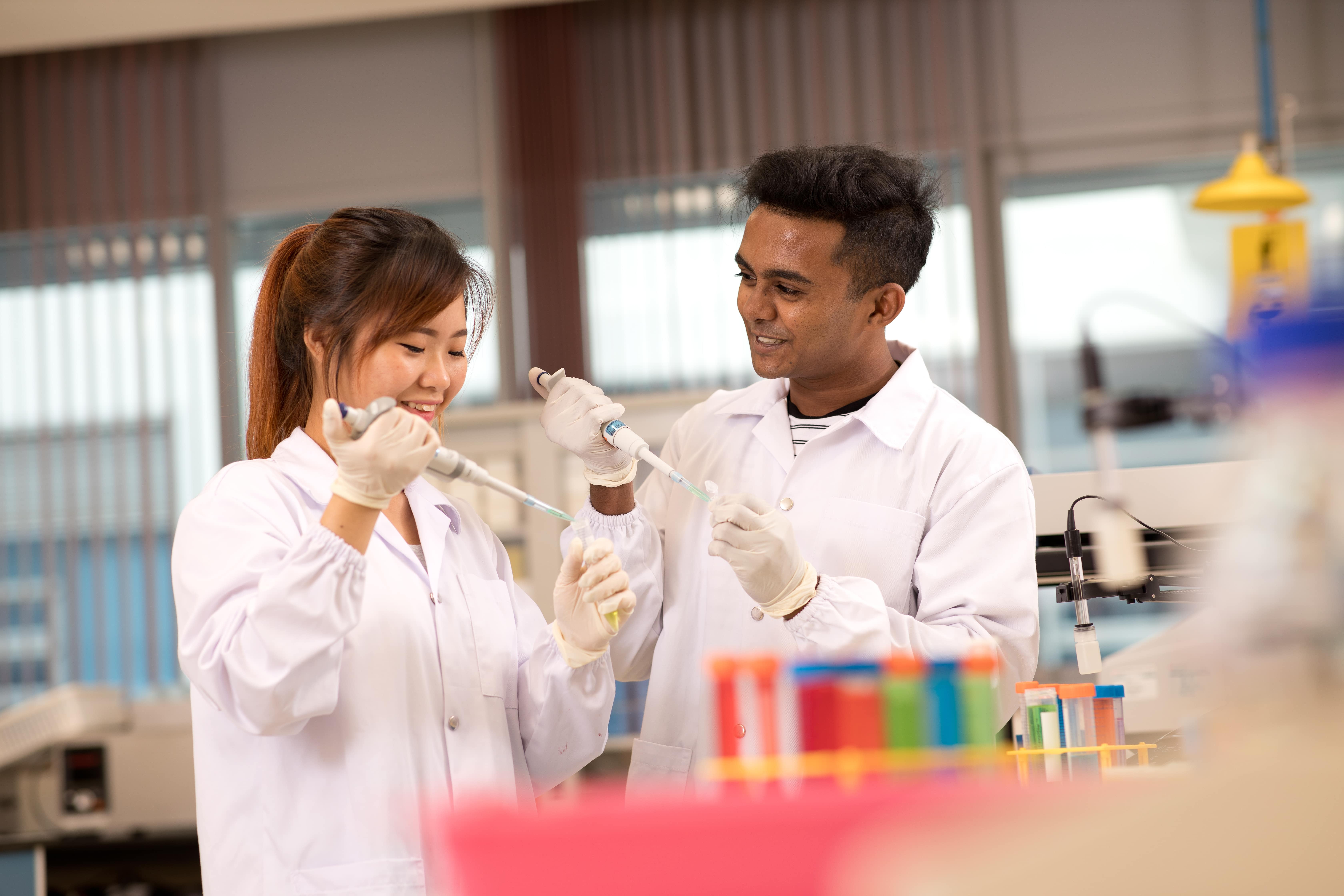 Two student researchers