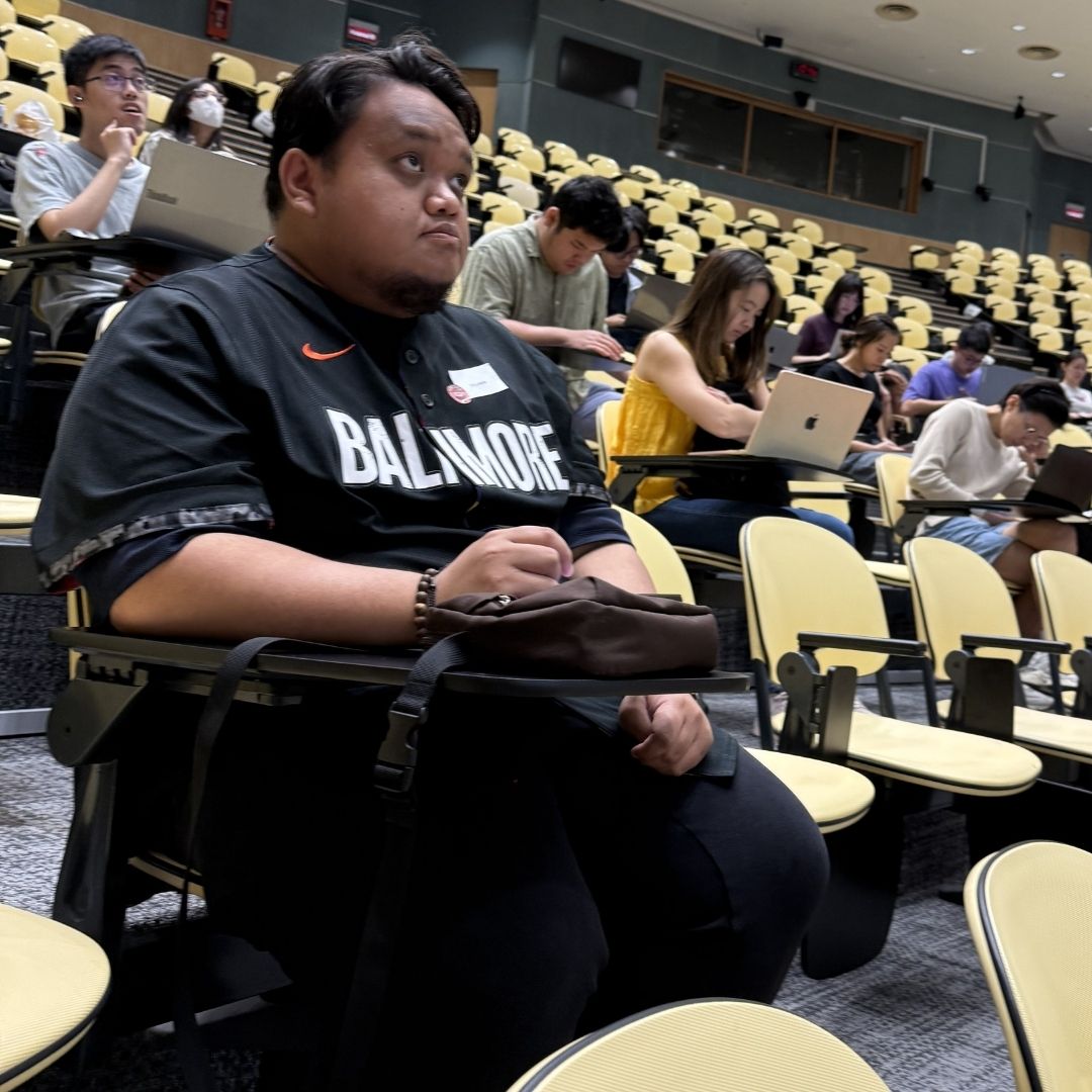 Student listening to IGP Colloquium