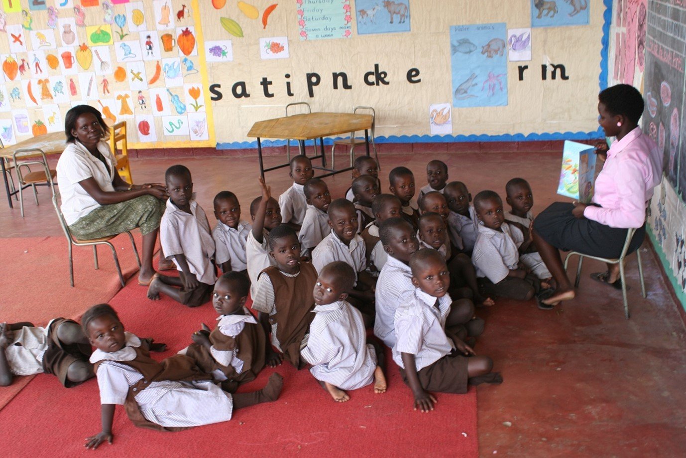 Prof Sung Feeding a Child