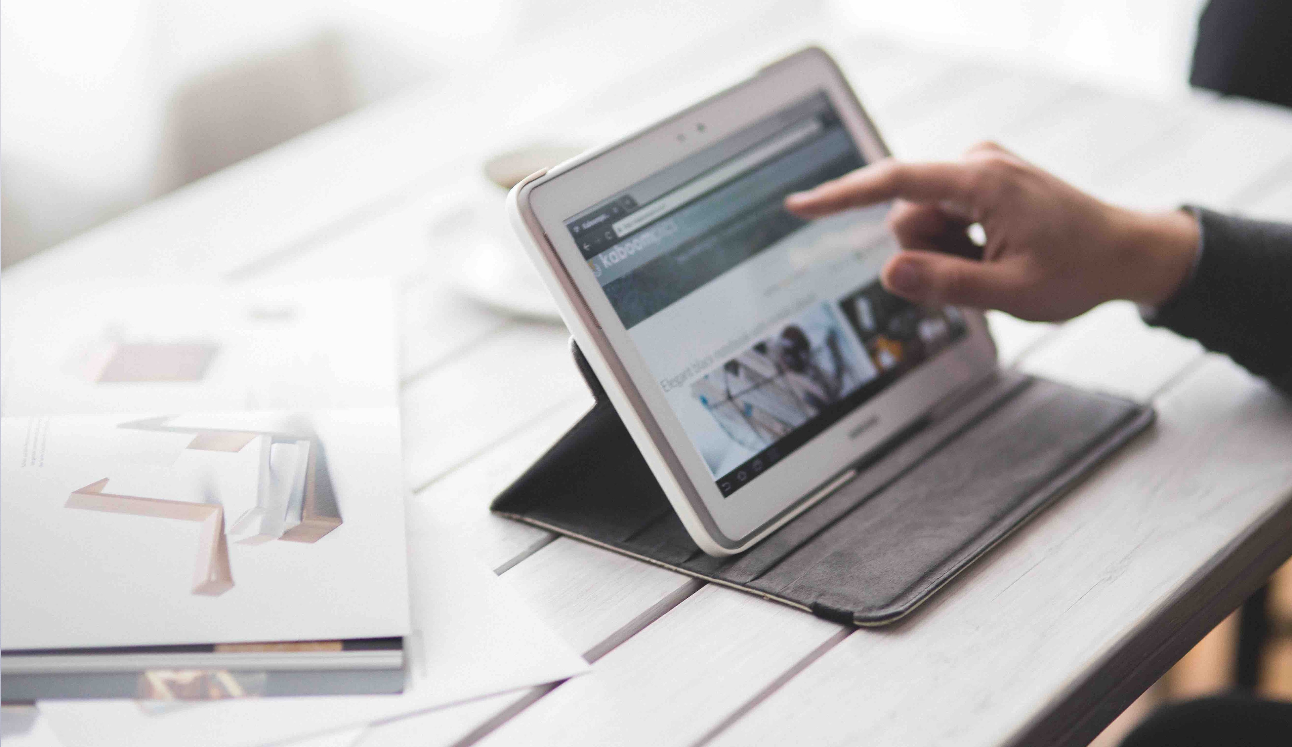 businessman-working-with-tablet04831a5b12dc471087ce4d591226f4d2 businessman-working-with-tablet04831a5b12dc471087ce4d591226f4d2