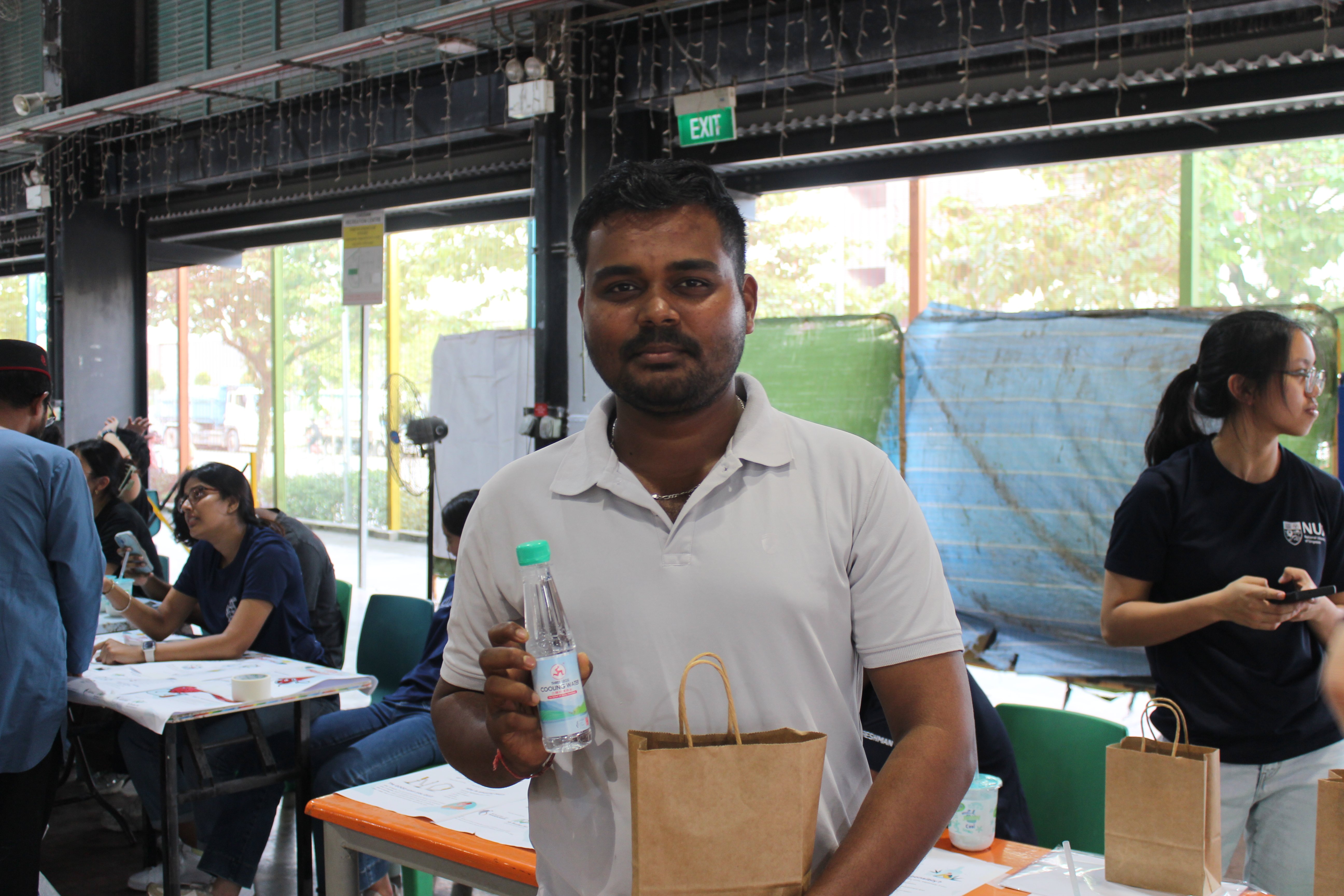 Happy Migrant Brothers with their goodie bags!