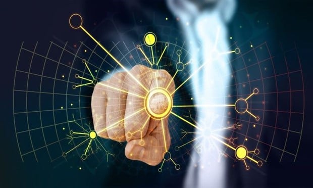 Finger pointing at digital screen to show computer science