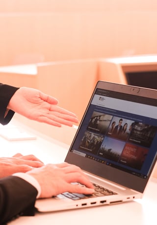 Working professionals browsing web page