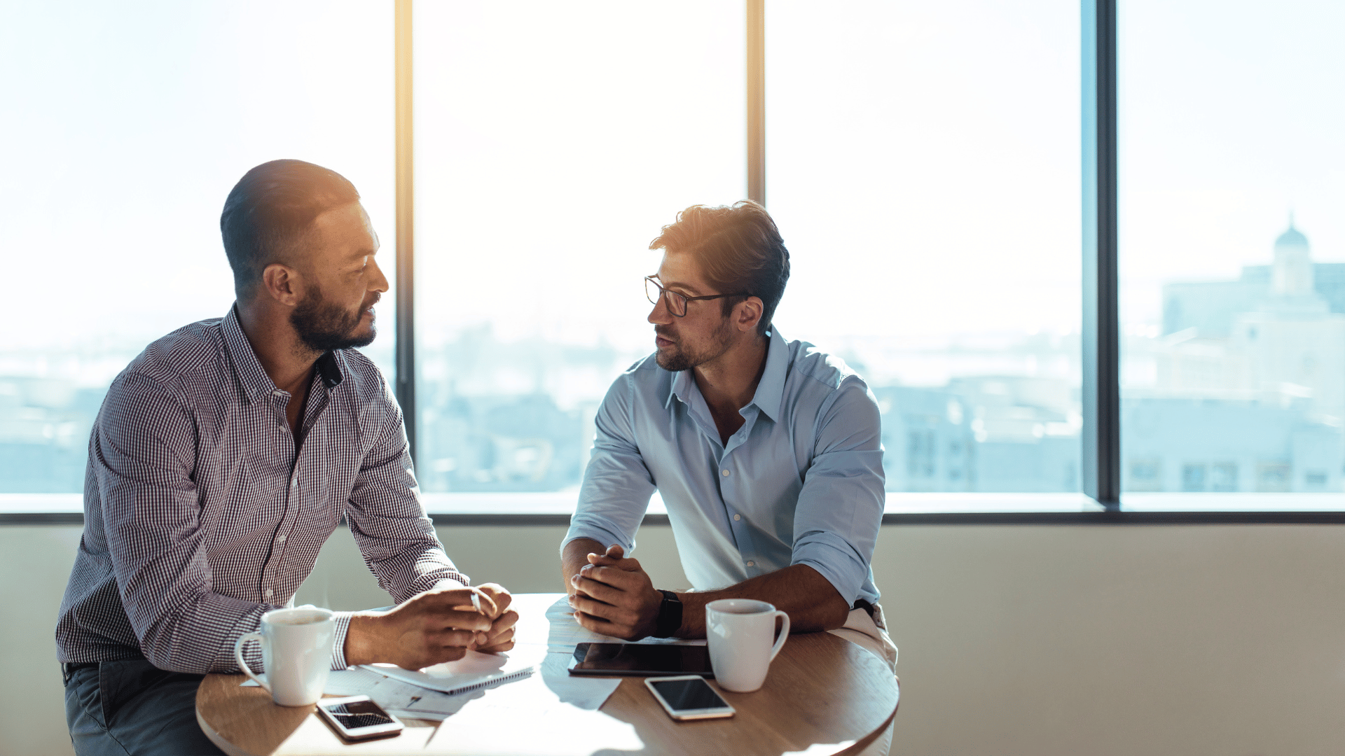 Business investors discussing business over a cup of coffee