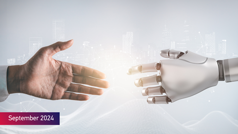 Handshake between human and robot hand with the text September 2024 on bottom left