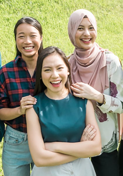 Smiling Group of 5 Students On A Grass Patch Chinese Girl Blue Red Gingham Plaid Top (mobile)