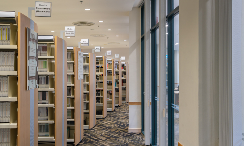 NIE library with many columns of book shelves
