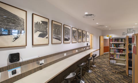 NIE library with bar table study section