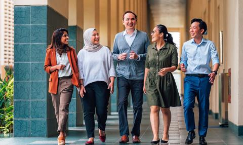 NIE staff walking together